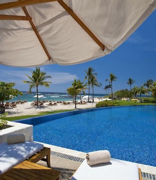 Hacienda de Mita 304 is a Punta Mita resort beachfront condo with all of the amenities of a five star resort and the conveniences of home. This 3,500 square foot unit has three bedrooms and 4.5 baths and unbelievable views. This beautifully decorated Punta Mita rental has a fully equipped kitchen with top of the line appliances (Wolff and Sub-Zero...