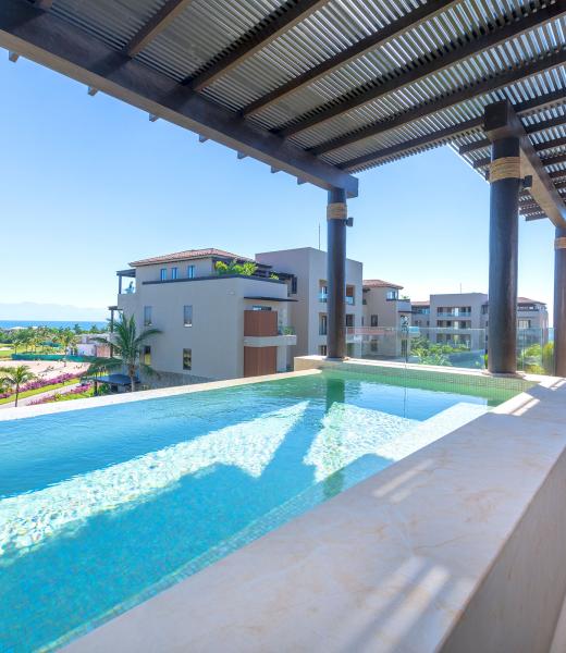 Condo Sardan is a lovely three-bedroom Punta Mita villa at Tau. This luxury resort rental is positioned between the mesmerizing ocean and the prestigious golf course, providing an unparalleled panorama view from every angle. Condo Sardan is a luxurious retreat with seamless integration of indoor and outdoor spaces that invite breathtaking views...