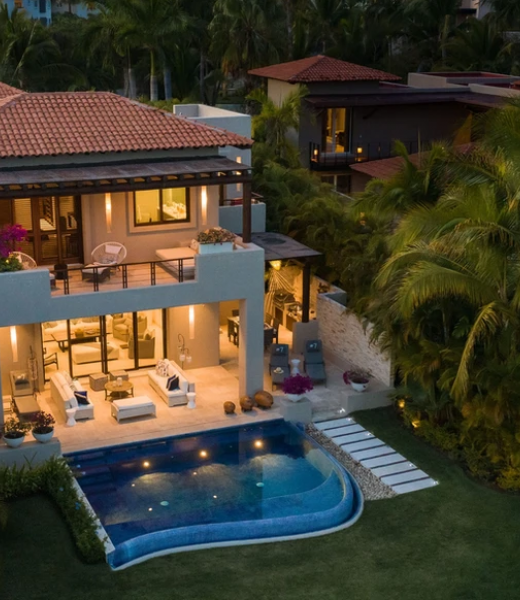 Casa Amor is a two-story villa with 4 bedrooms that can accommodate 10 guests.  Located in the El Encanto development, this exclusive Punta Mita vacation villa exudes a sense of refined warmth. The walls are painted in soft tones, providing a serene backdrop that allows the carefully chosen decor to shine. Tasteful artwork and framed photographs...